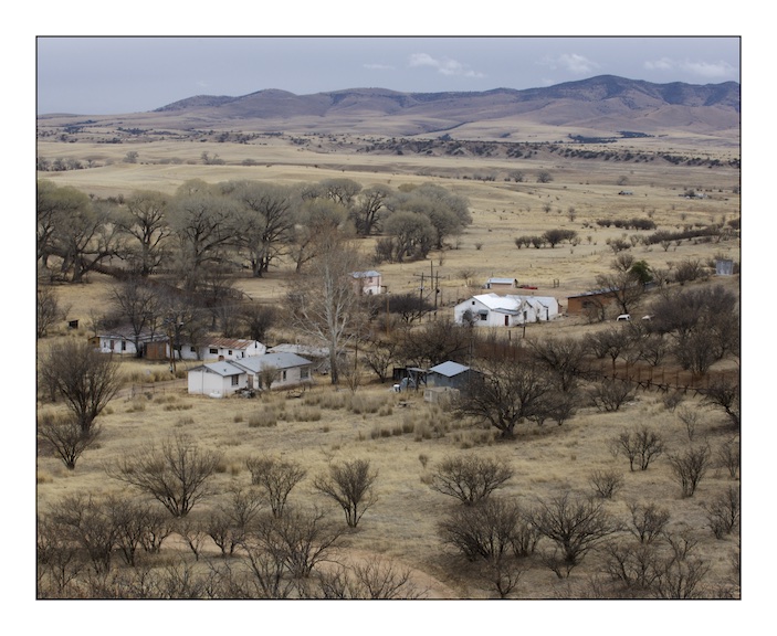  The hamlet of Lochiel in the Coronado National Forest east of Nogales in Southern Arizona. The Border fence that divides Mexico from the United States cuts straight through the middle of this small settlement. Lochiel is now all but deserted, the only inhabitants I saw were on the Mexican side and they used the border fence as one wall of a chicken coop. Lochiel is close to the location where the Spanish conquistador Francisco Vasquez de Coronado led the first European migration into what is now the North American Southwest.&nbsp; 