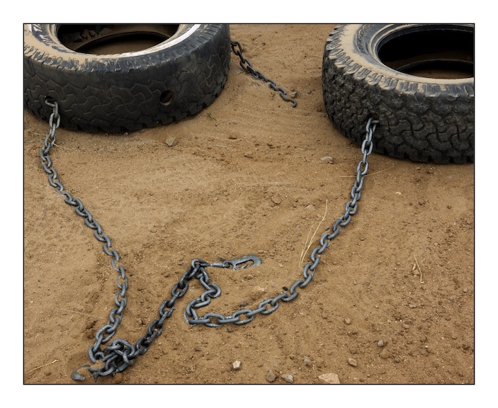  Truck tyres used by the United States Border Patrol to ‘cut’ the desert trail. ‘Cutting the trail’ entails dragging car tyres behind a vehicle to sweep the desert trail. This is usually done in the evening so that any migrant footprints made overnight will be visible in the morning and allow Border Patrol trackers to follow them through the desert. 